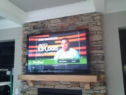 Tv Mounted Over Stone Fireplace Mr