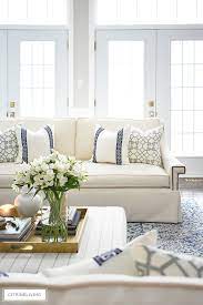 living room reveal with new white sofas