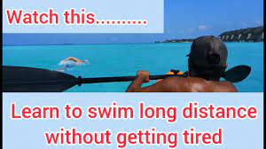 how to swim long distance without