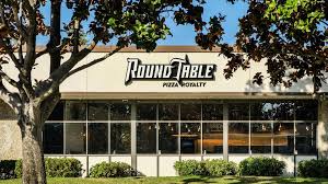 redesigned round table pizza opens in
