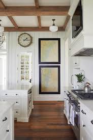 white ceiling with stained wood beams