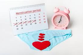 menstrual calendar with crossedout dates
