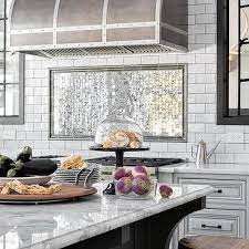Mirrored Tiles Behind Stove Design Ideas