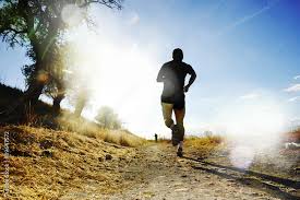 silhouette of young sport man running