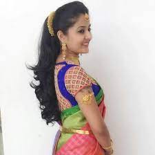 Instead of more traditional hairdos like a bun or a. Beautiful Bride With Cute Smile And Simple Make Up Hairstyle Saree Hairstyles Indian Hairstyles Indian Bridal Hairstyles