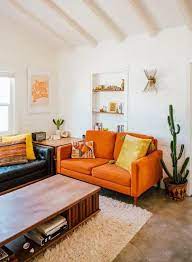 38 Ways To Incorporate An Orange Sofa