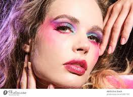 stylish young model with bright makeup