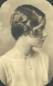 Part your hair either in the middle or to the side. Finger Wave Wikipedia