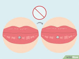 how to take care of lip piercing a