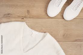 white women sweater and sneakers on