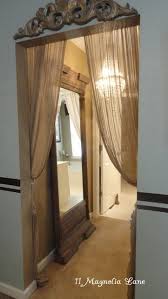 There are several ways to hide the door. Tension Rod And Filmy Curtains And An Architectural Piece Above The Doorway Great Way To Dress Up A Hallway Or Zuhause Diy Zuhause Dekoration Produktdesign