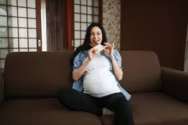 pregnant woman belly the home