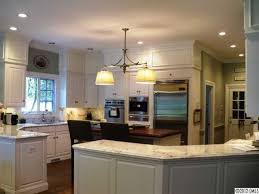 Comfortable height for most people to reach items in cabinets is between 5 and 6 feet. Not Sure If Those Are Soffits Above The Cabinets But That Would Be A Great And Inexpensive Way T Kitchen Soffit Kitchen Cabinet Design Kitchen Cabinet Molding