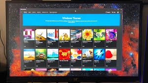 how to use themes in windows 10 for a