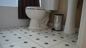 remove stubborn stains on toilet tiles