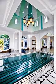 Indoor swimming pool installation cost. View Pictures Of Exquisite Indoor Pool Designs An Indoor Swimming Pool Offers The Luxury Of Yea Luxury Swimming Pools Indoor Pool Design Indoor Swimming Pools