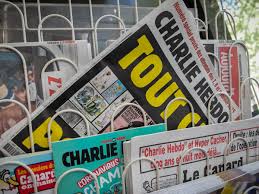 Who's laid down on the ground and struggling for air. Charlie Hebdo Criticised For Offensive Cartoon Of Meghan Charlie Hebdo The Guardian