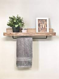 Deck out your room with these install shelves with inverted brackets for a sweet look that also helps wrangle loose items, like towel piles. Use Towel Rack In Kitchen Instead Of Under The Sink Farmhouse Towel Bars Floating Shelves Bathroom Shelves