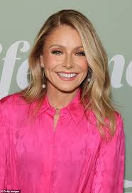 kelly ripa looks radiant in hot pink