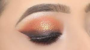 glittery orange with smokey winged eye