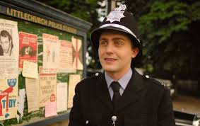 who plays the policeman in the larkins