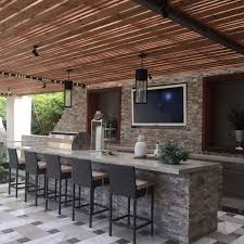 From stunning outdoor kitchen islands at ct stone, we're proud to carry all the quality exterior stone products needed to turn any outdoor space into a gorgeous and functional outdoor. Outdoor Kitchens Using Stacked Stone To Inspire Your Man Cave Dreams
