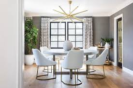 We believe that gold dining chairs exactly should look like in the picture. White And Gold Dining Chairs With Round Concrete And Wood Dining Table Transitional Dining Room