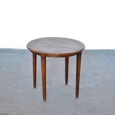 Round Wooden Coffee Table On Four Legs