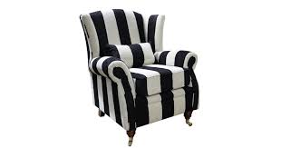 Who says simple black and white chairs can't also be bold and brash? Wing Chair Fireside High Back Armchair Harrison Stripe Black Designersofas4u