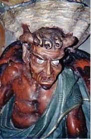 Le Diable du bénitier. Le diable représenté dans l'église serait le démon Asmodée, gardien du trésor du roi Salomon. 