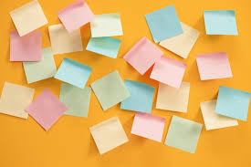 blank sticky notes on yellow background