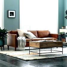 A bulky sofa can eat up living room space quickly, so if you have an especially tiny room, ask yourself if you could manage with an equally comfy but far less invasive 'snuggler' or 'loveseat'. Light Brown Leather Couch Light Brown Leather Sectional Living Room Ideas With Brown Leather Suite 942977 Hd Wallpaper Backgrounds Download