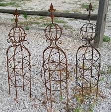 Measure 15 inches up from the bottom of all four legs and make a small mark. Mystic 26 Small Sphere Garden Obelisk Topiary