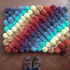 make your own adorable pompom rug in 6
