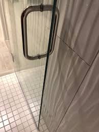 shower door hits the wall