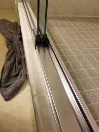 bottom sliding shower track