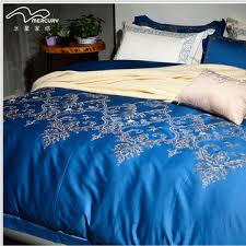 blue luxurious embroidery cozy bed set