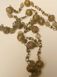 reliquary relika necklace gold filigree