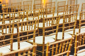 wedding venue stacking chiavari chairs