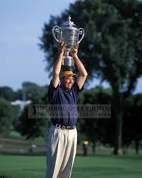 rich beem holding his trophy 2002 pga