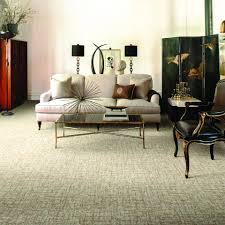 lay an area rug over carpet flooring