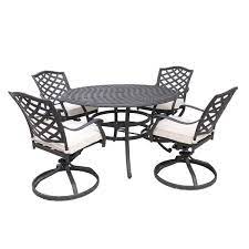 Design a warm and inviting outdoor dining set around the madison wicker 5 piece round patio dining set with cushions. Paseo 5 Piece Outdoor Round Dining Set With Swivel Chair American Home Furniture Store And Mattress Center Albuquerque Santa Fe Farmington Nm