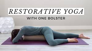 restorative yoga with one bolster 5