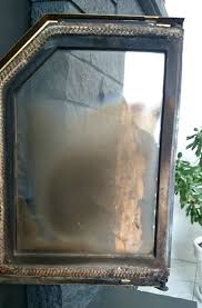 how to clean glass fireplace doors