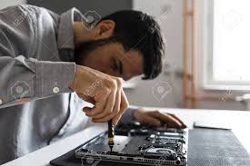 We available 24/7 so you can call us anytime and get your error fix. Computer Repair Technician Working On A Laptop With Small Tools Stock Photo Picture And Royalty Free Image Image 104975388