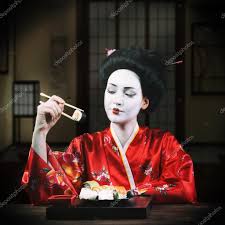 geisha makeup eating sushi stock photo