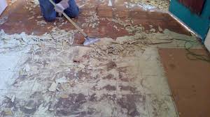 remove old linoleum from wood floor