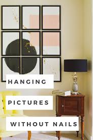 Download nail hanging images and photos. How To Hang Pictures Without Nails Sarah Akwisombe