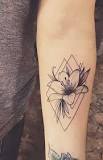 What flower symbolizes strength tattoo?