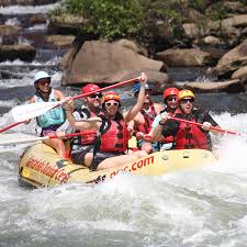 To start the middle ocoee river, we must carry our rafts down a ramp next to a small dam at the end of the small lake. Nashville Whitewater Raft The Middle Ocoee